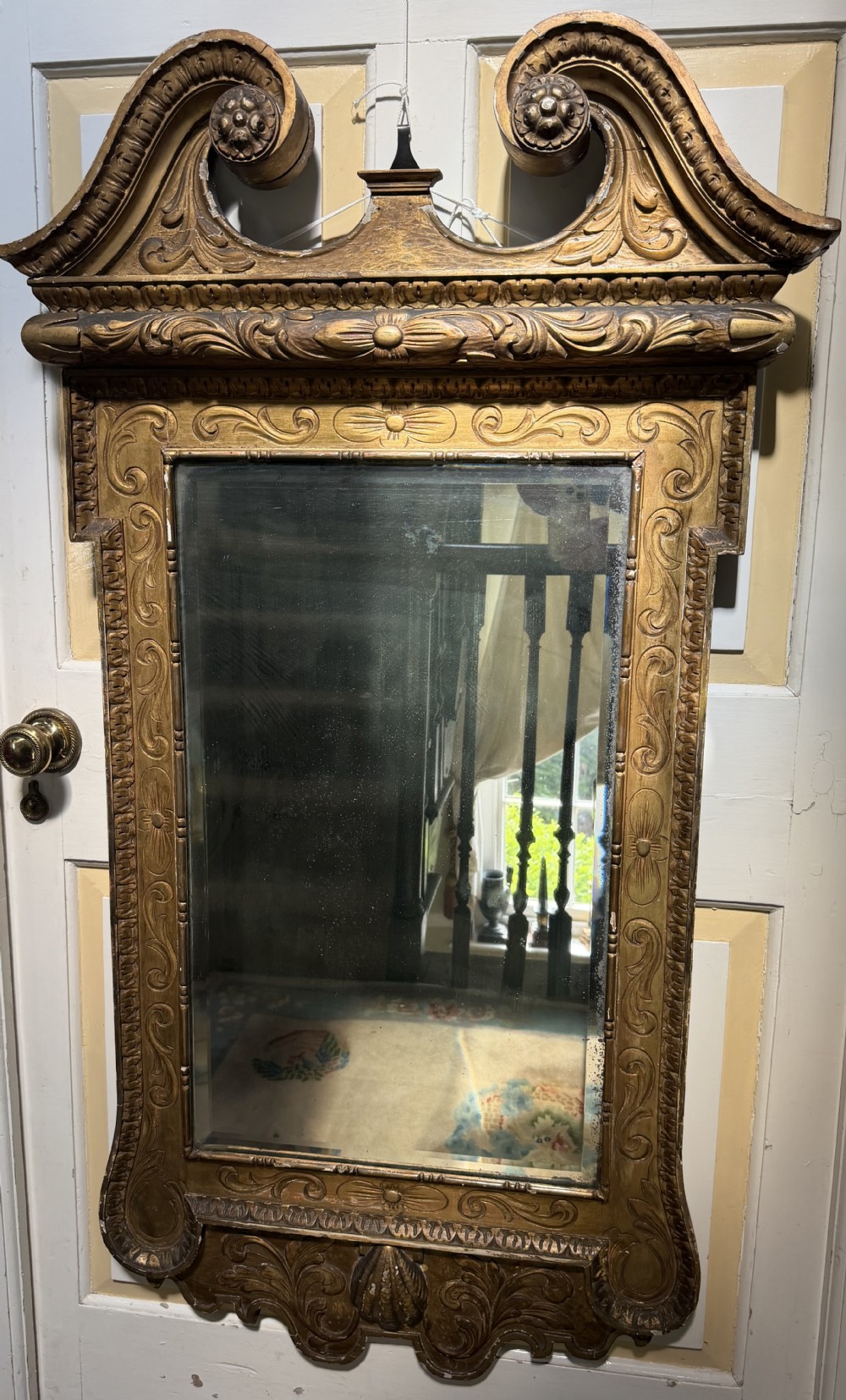 Mid 19th-century George II style carved giltwood pier mirror featuring a swan-neck pediment and carved shell apron. View XI