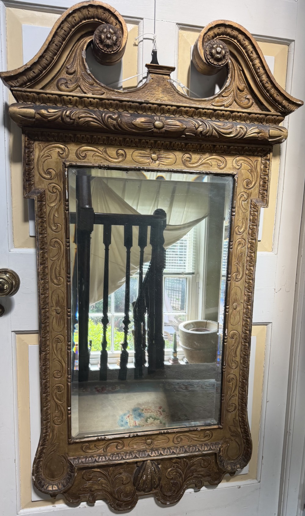 Mid 19th-century George II style carved giltwood pier mirror featuring a swan-neck pediment and carved shell apron. View XVII
