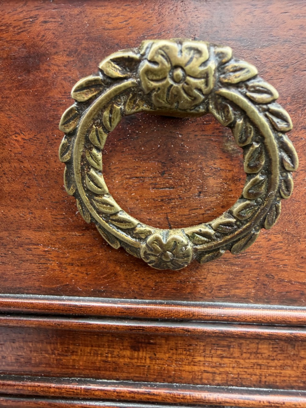An early nineteenth-century George III mahogany low bookcase featuring two top frieze drawers over glazed twin doors and turned feet. View XIX