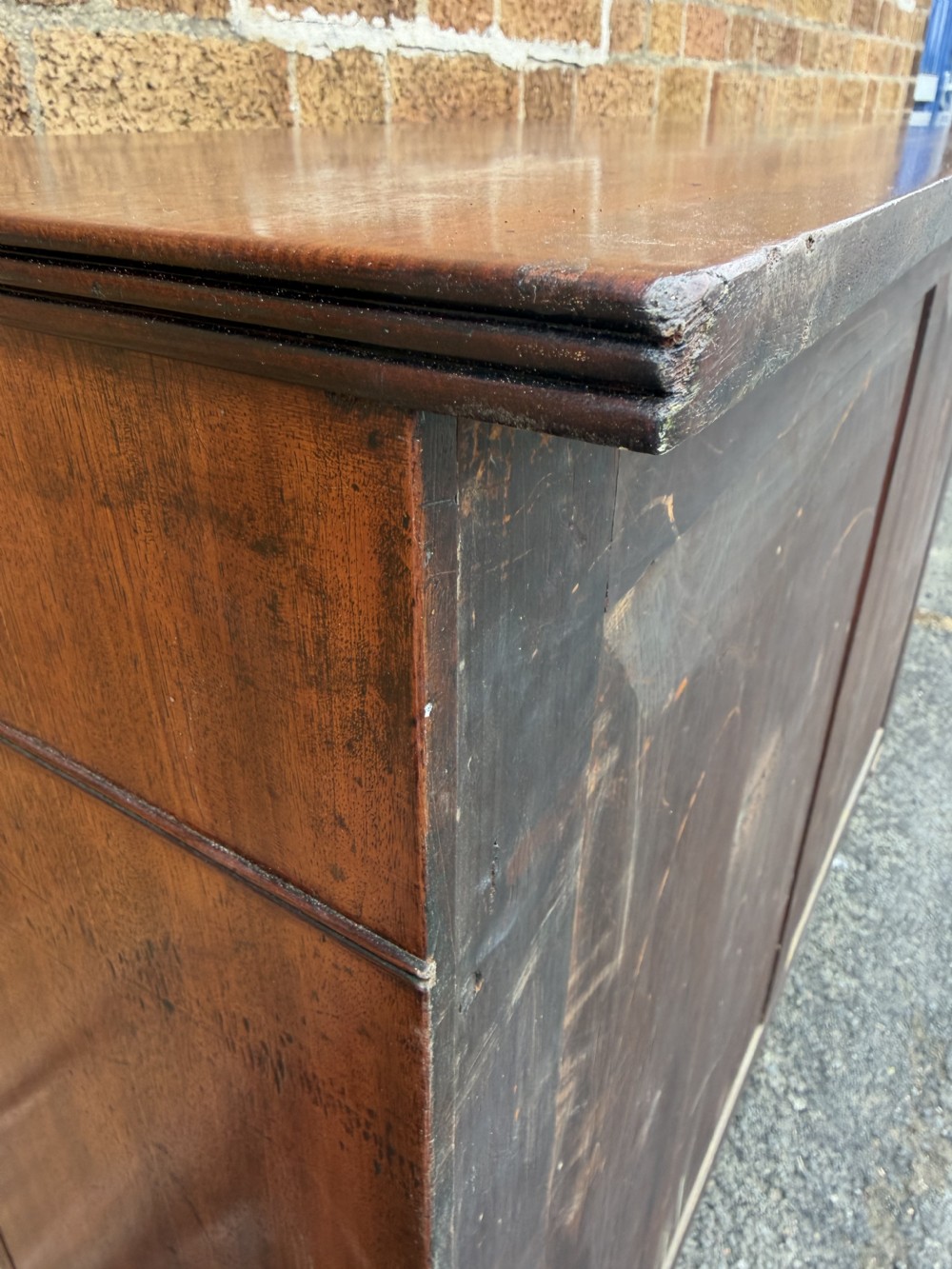 An early nineteenth-century George III mahogany low bookcase featuring two top frieze drawers over glazed twin doors and turned feet. View XXIII