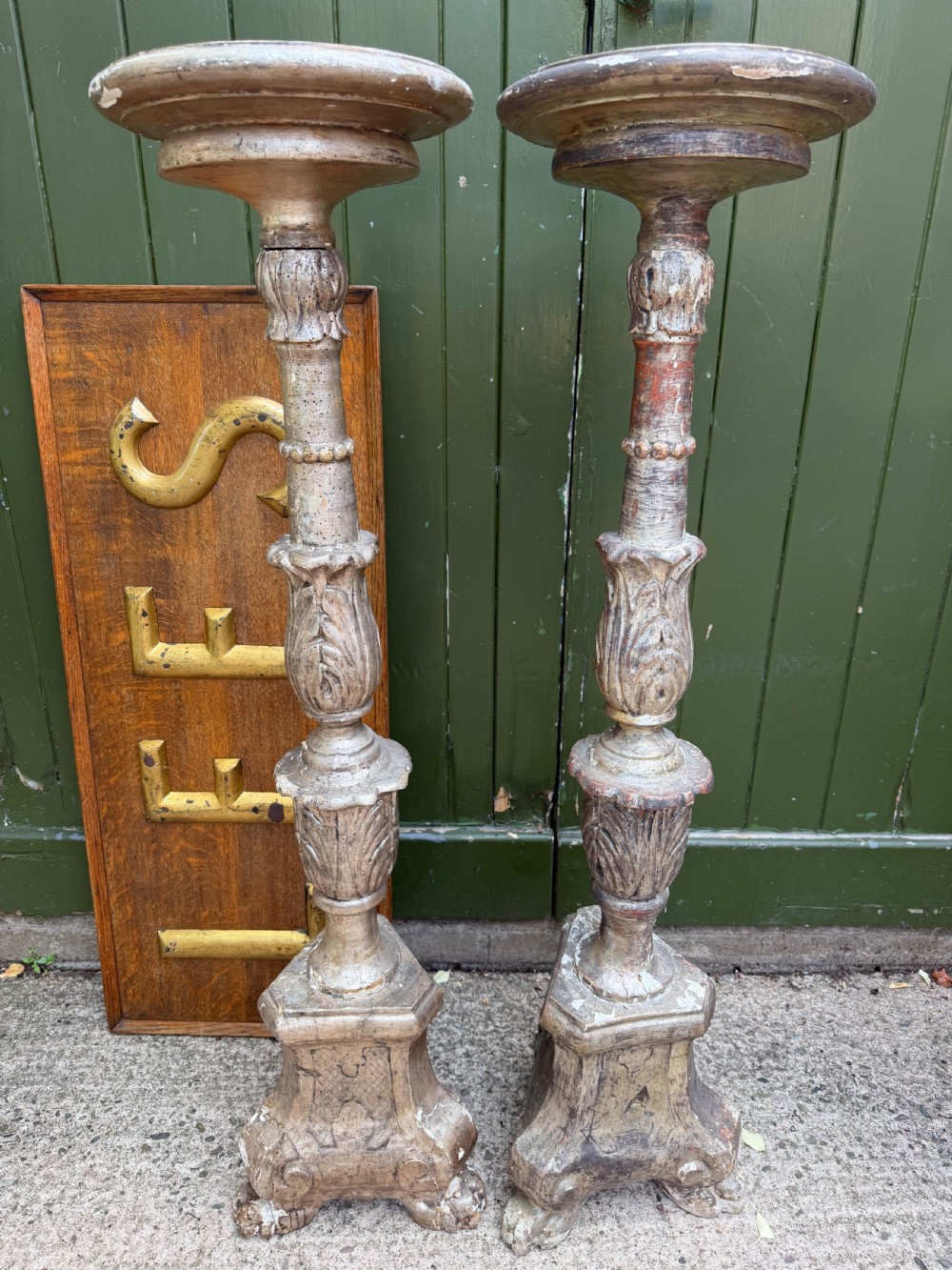 Tall pair of C18th Italian carved and silvered torcheres or candle-stands .