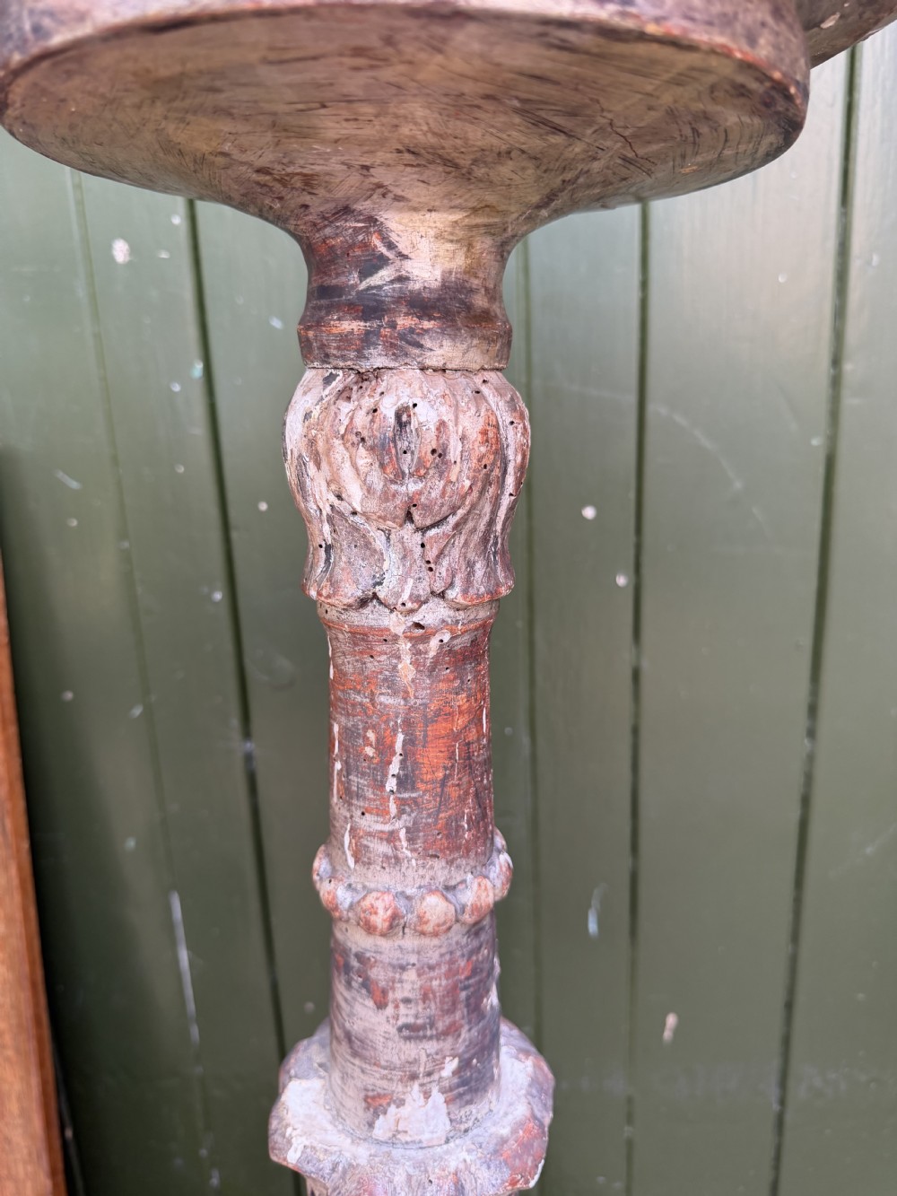 A pair of tall 18th-century Italian carved wood torcheres featuring baluster turned shafts with acanthus leaf details and an aged silver leaf finish. View XI