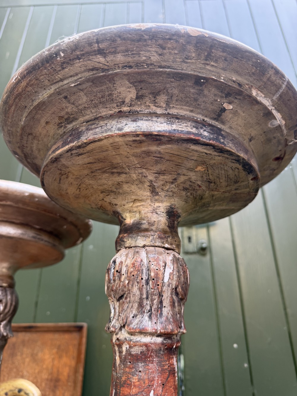A pair of tall 18th-century Italian carved wood torcheres featuring baluster turned shafts with acanthus leaf details and an aged silver leaf finish. View XIII