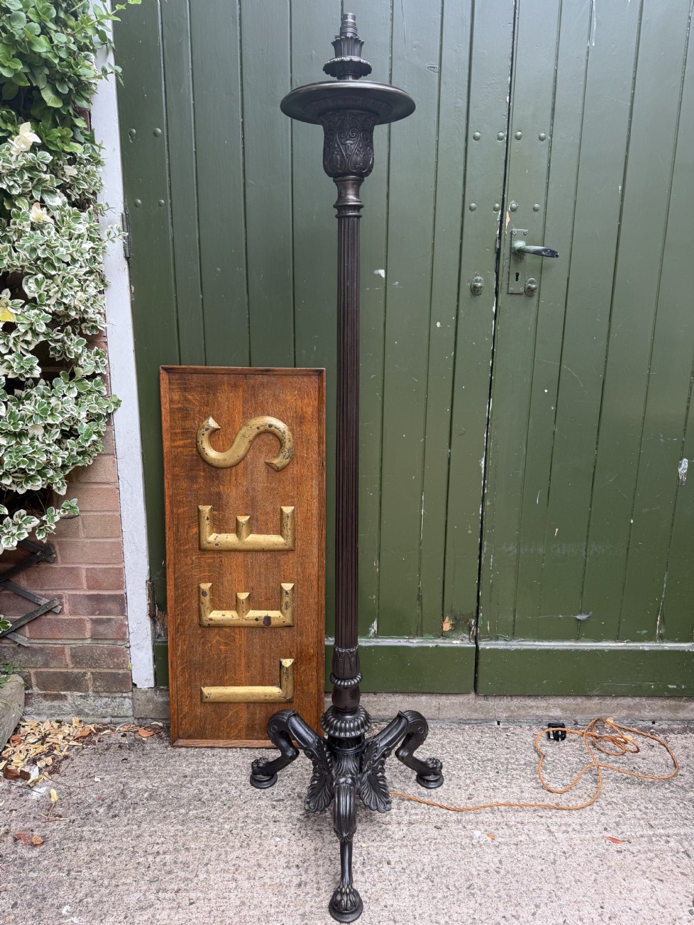 A tall late nineteenth-century cast-iron standard lamp with a dark bronze patinated finish, featuring a fluted column shaft, acanthus leaf moulding, and a tripod claw foot base. View XI