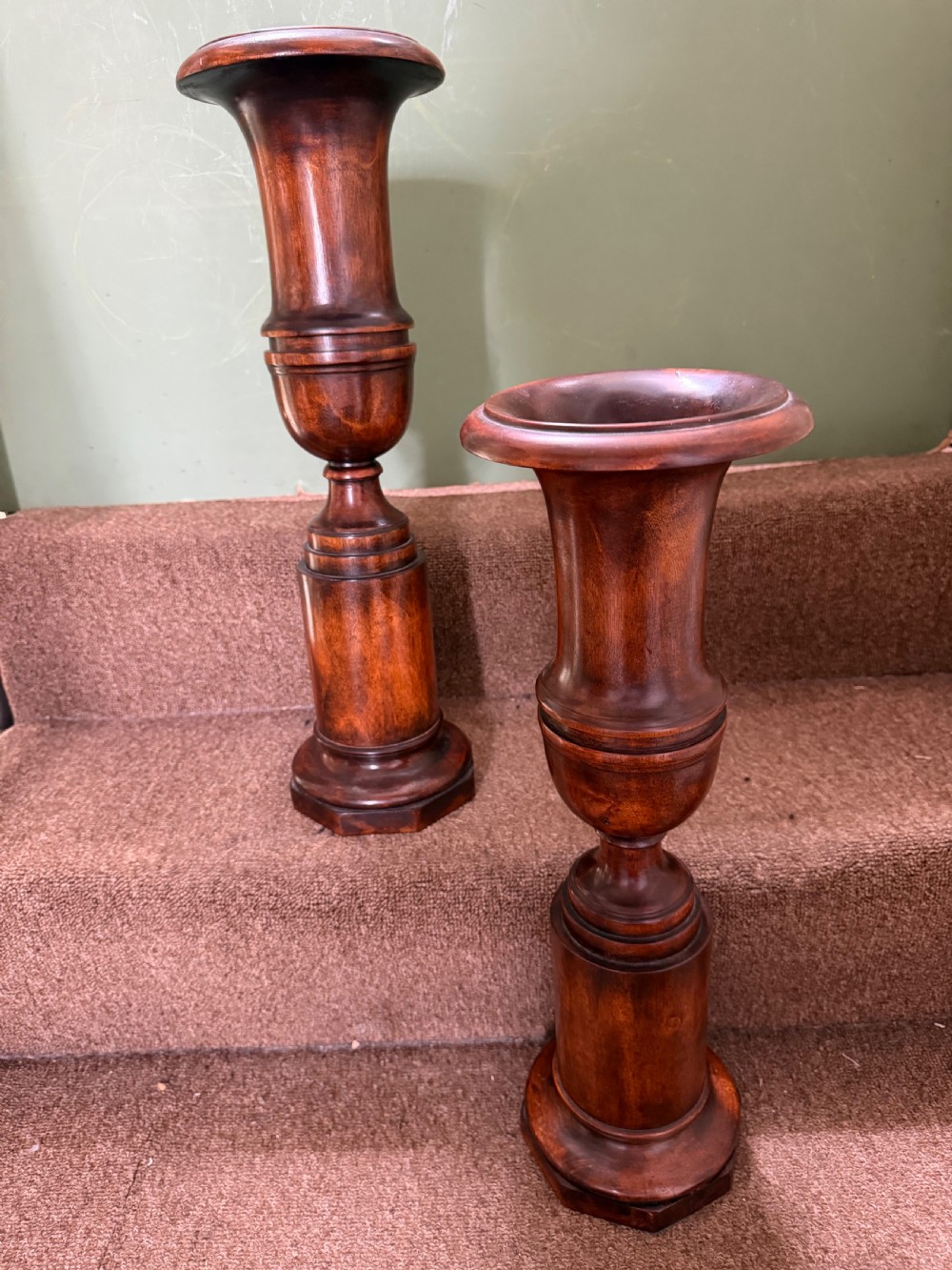 A pair of 19th-century turned walnut decorative vases featuring flared tops, baluster-turned stems, and stepped octagonal bases. View III