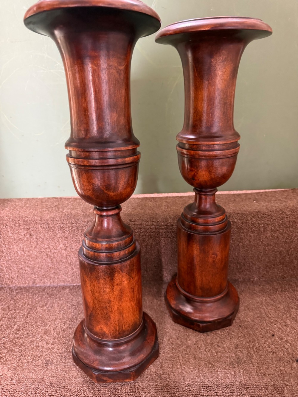 A pair of 19th-century turned walnut decorative vases featuring flared tops, baluster-turned stems, and stepped octagonal bases. View IV