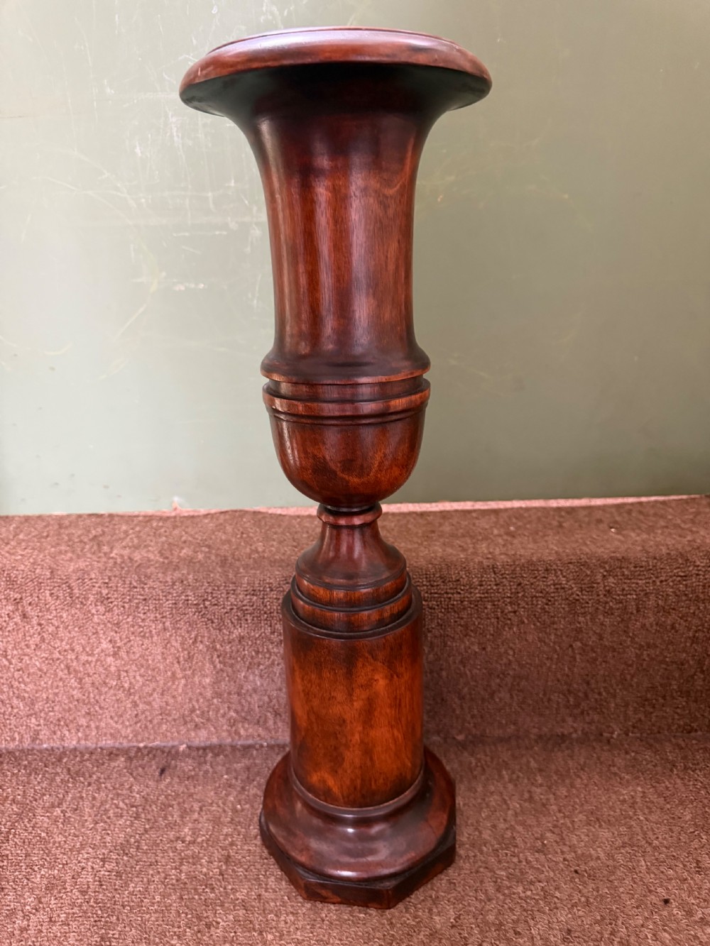 A pair of 19th-century turned walnut decorative vases featuring flared tops, baluster-turned stems, and stepped octagonal bases. View VI