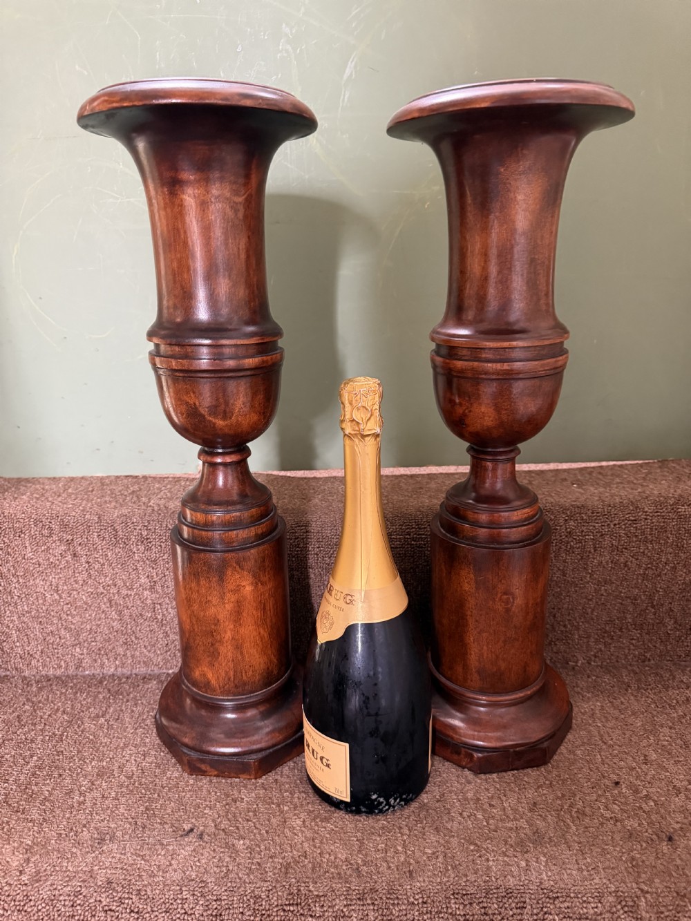 A pair of 19th-century turned walnut decorative vases featuring flared tops, baluster-turned stems, and stepped octagonal bases. View VIII