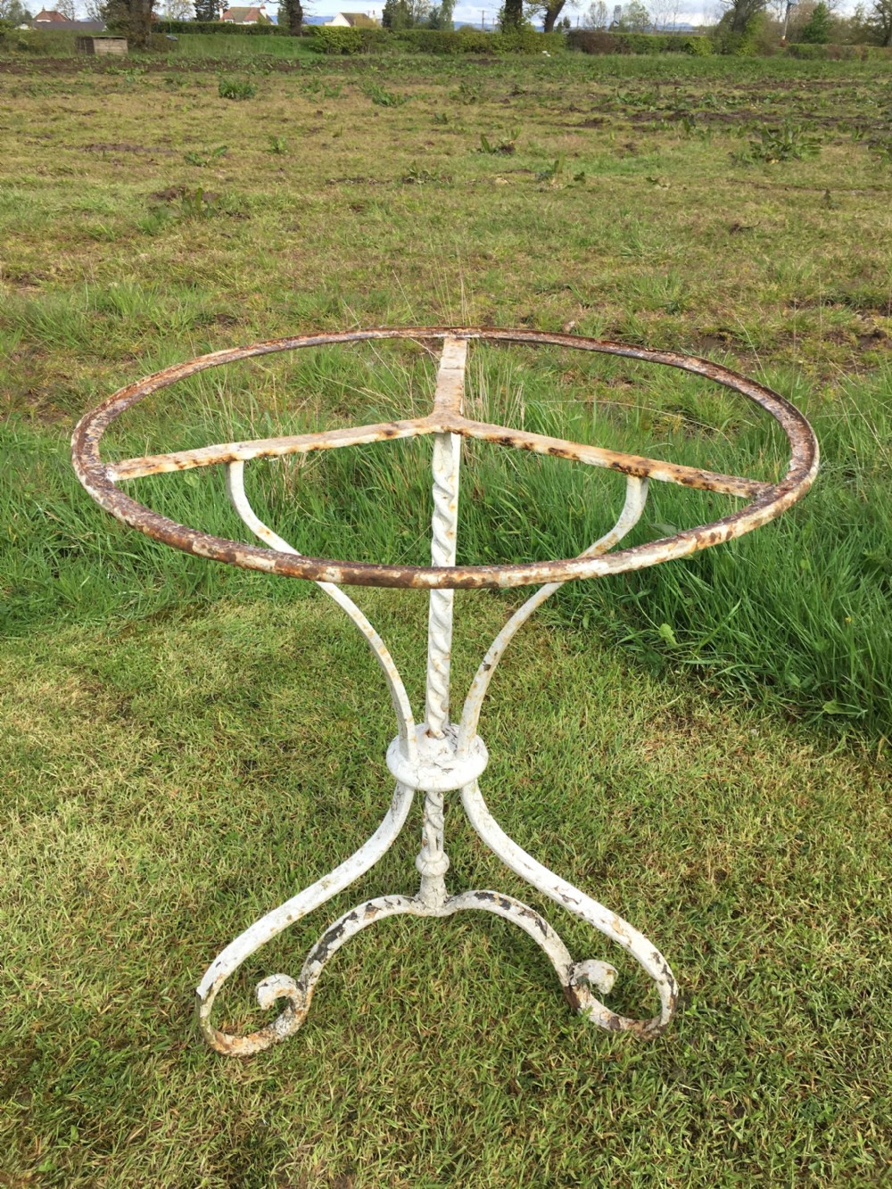 Good wrought iron garden table  View II