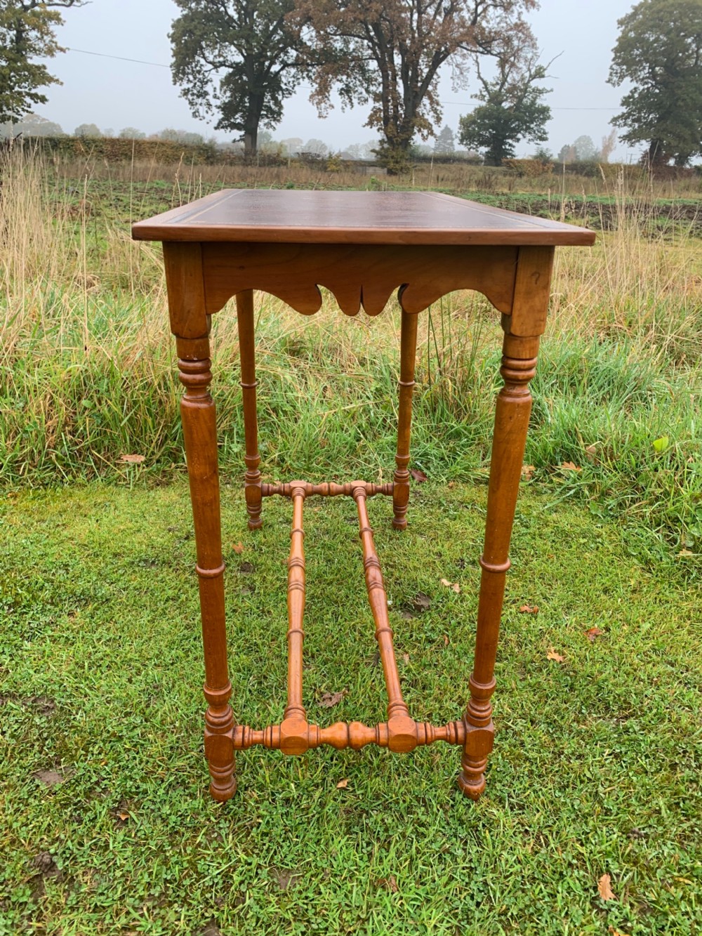 Elegant narrow walnut side table  View VI