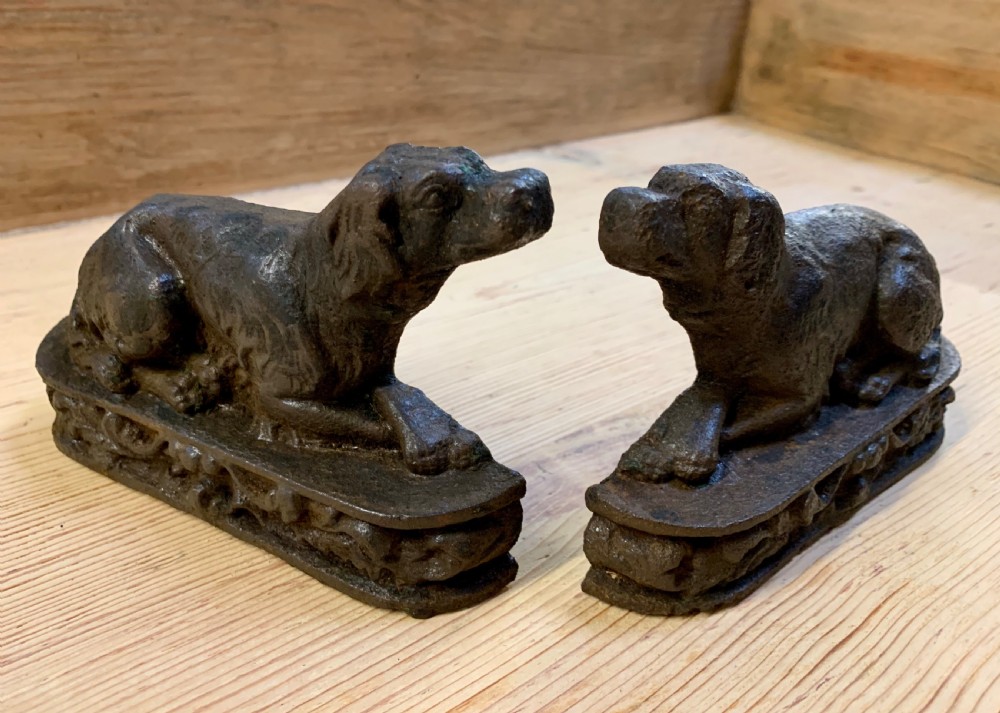 Pair cast iron dog doorstops