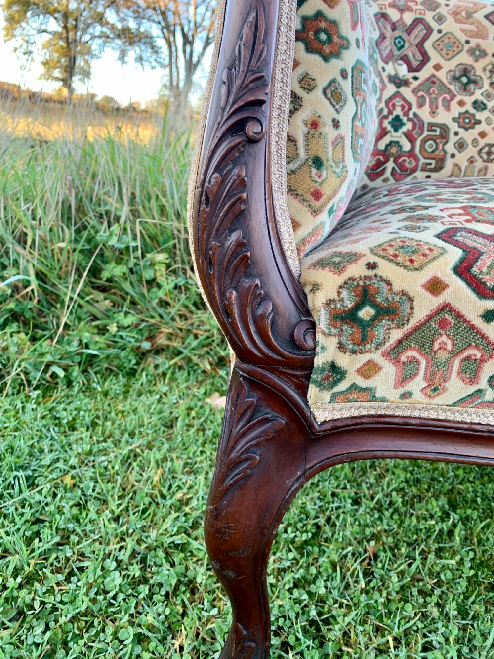 Tiny carved mahogany sofa View VIII