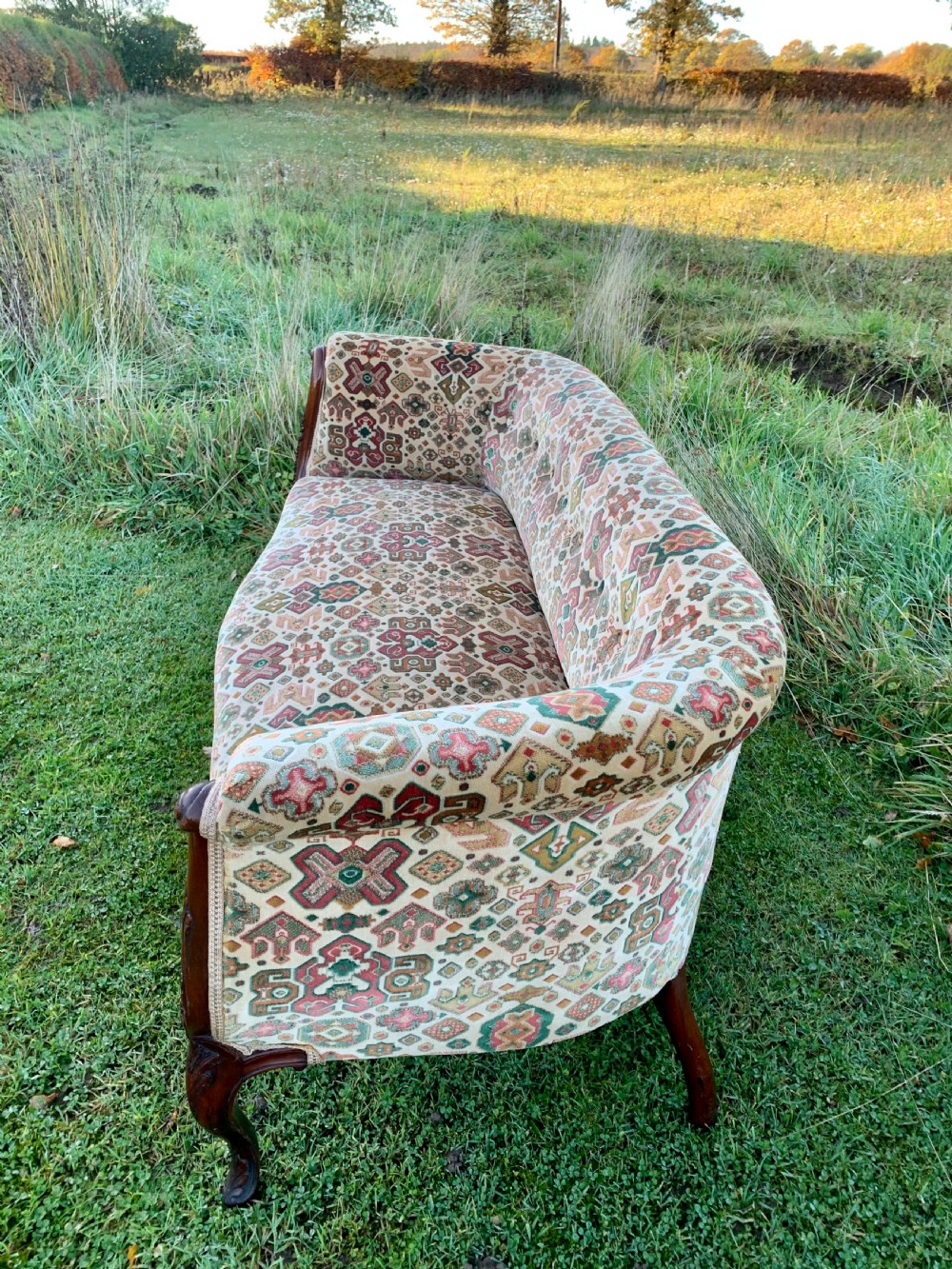 Tiny carved mahogany sofa View IX