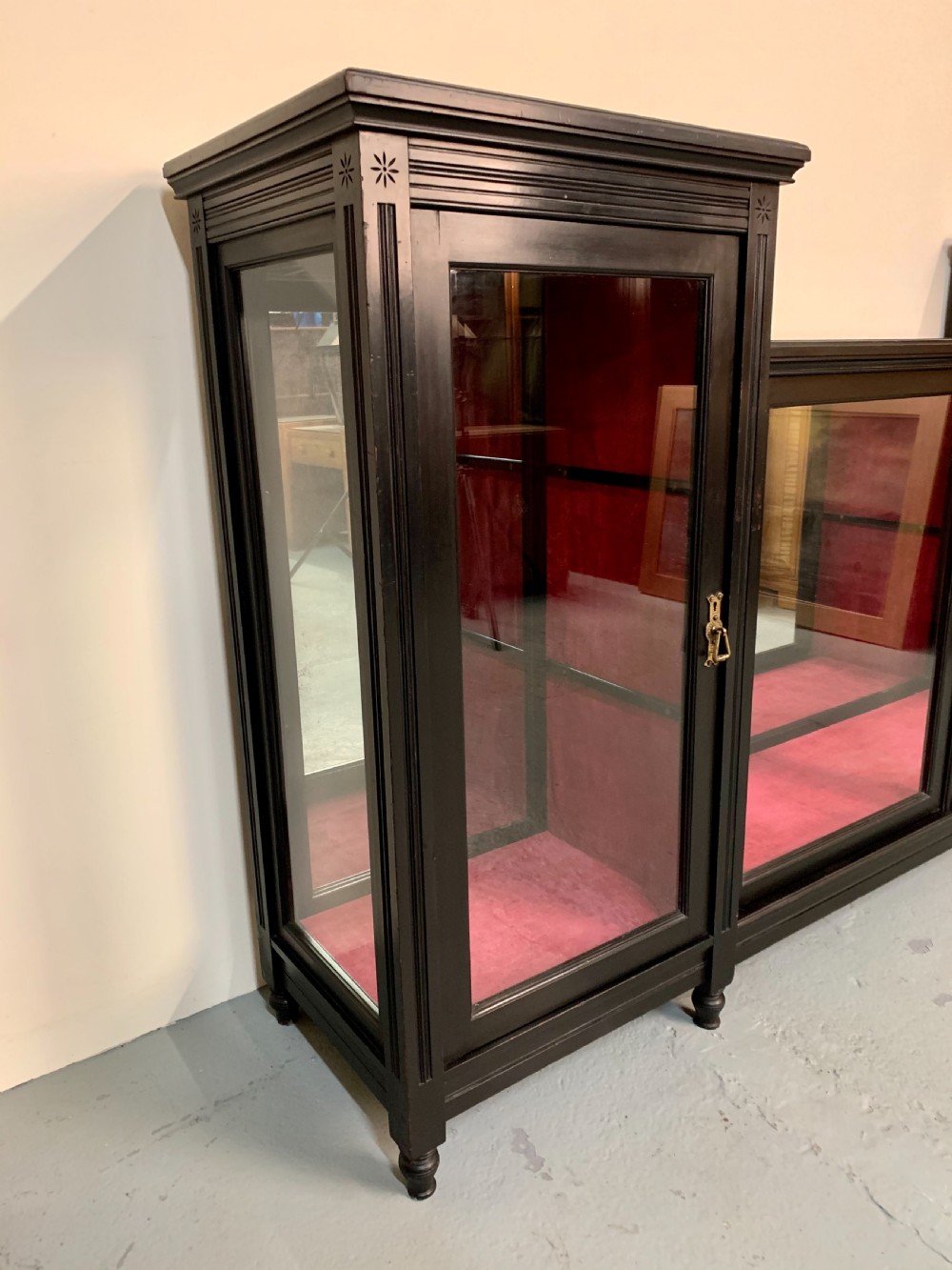 Good ebonised display cabinet  View VI
