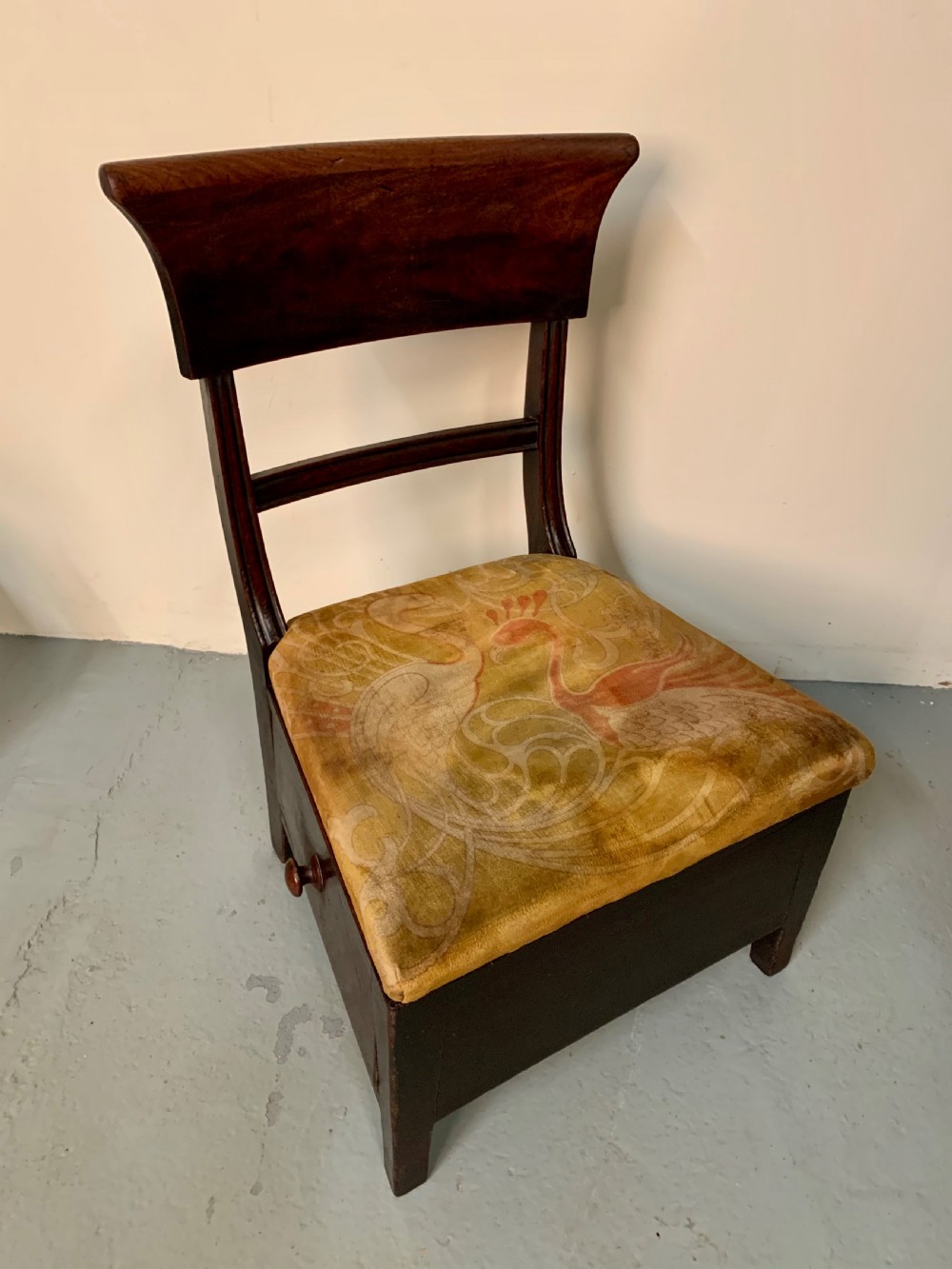 Unusual low chair with drawer  View III