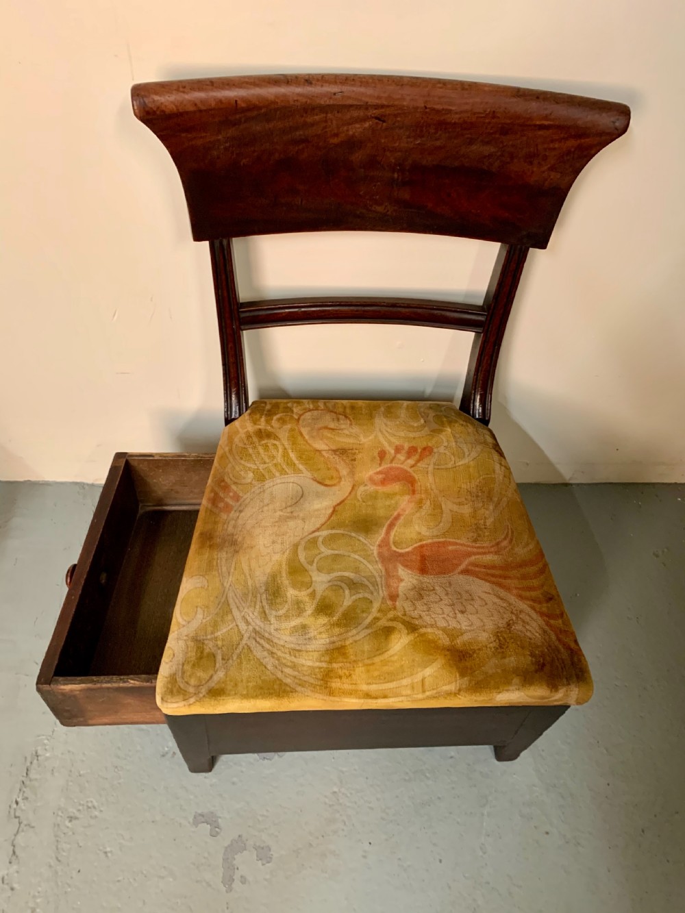 Unusual low chair with drawer  View VI