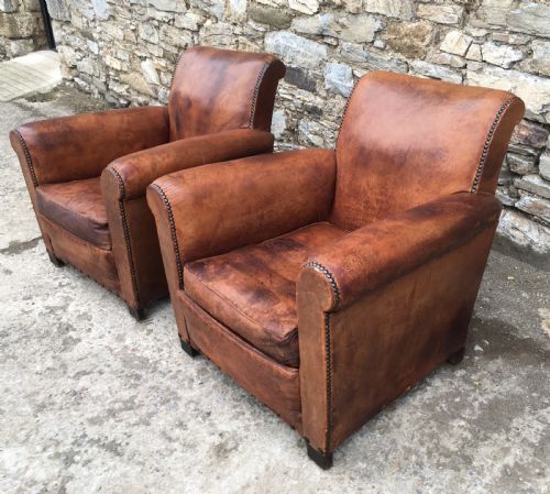 fig 2. Pair of Antique Leather Club Chairs
