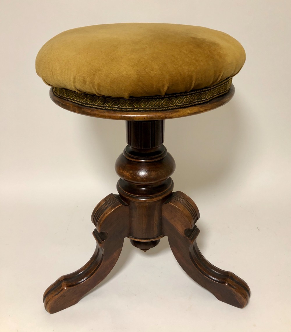 Antique Walnut Revolving Piano Stool