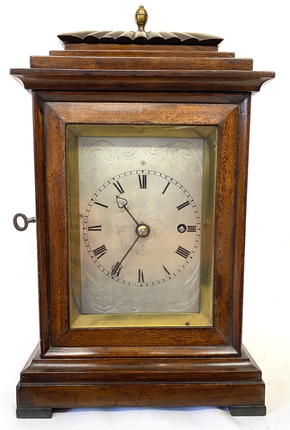 Antique Mahogany Single Fusee Four Glass Library Clock With A Shaped Top