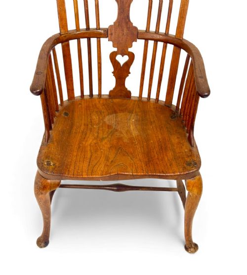 An 18th-century Thames Valley Windsor armchair featuring a high comb back with spindles, a pierced heart splat, a contoured saddle seat, and cabriole front legs. View IV