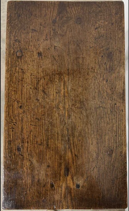 A 17th-century dark oak joint stool featuring a carved arcade frieze, turned legs, and sturdy base stretchers. View VIII