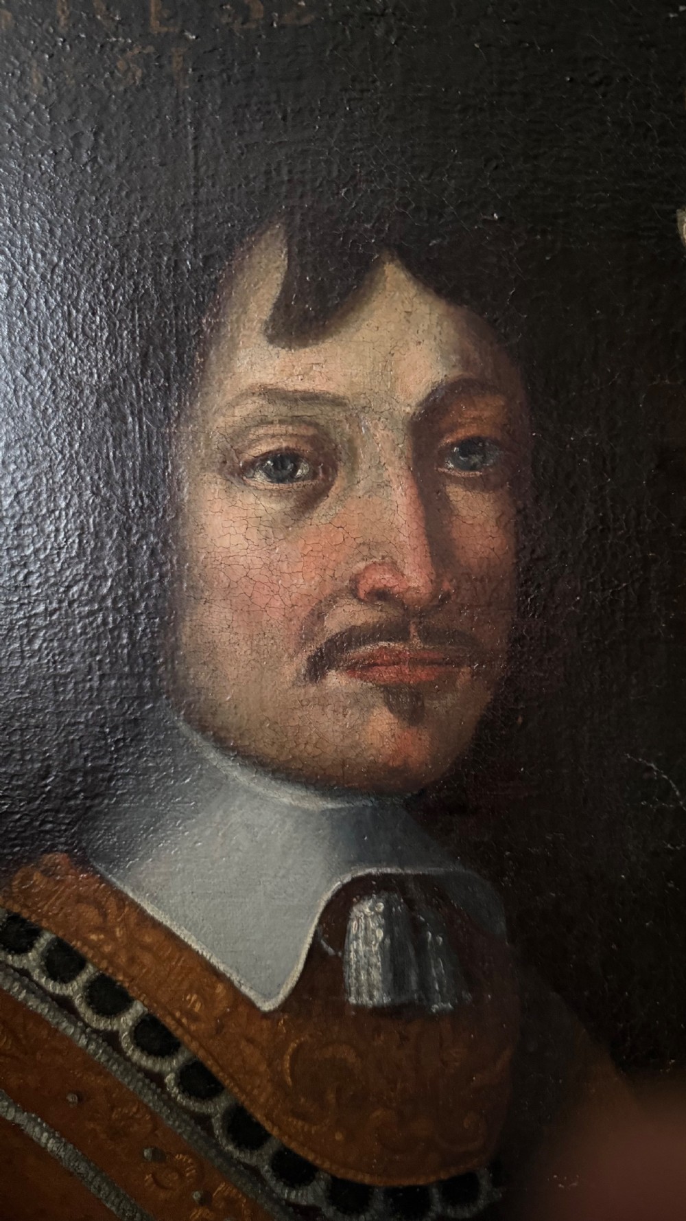 A pair of 17th-century Dutch oil portraits depicting a gentleman and a lady in period attire, set within matching burr walnut frames. View XVIII