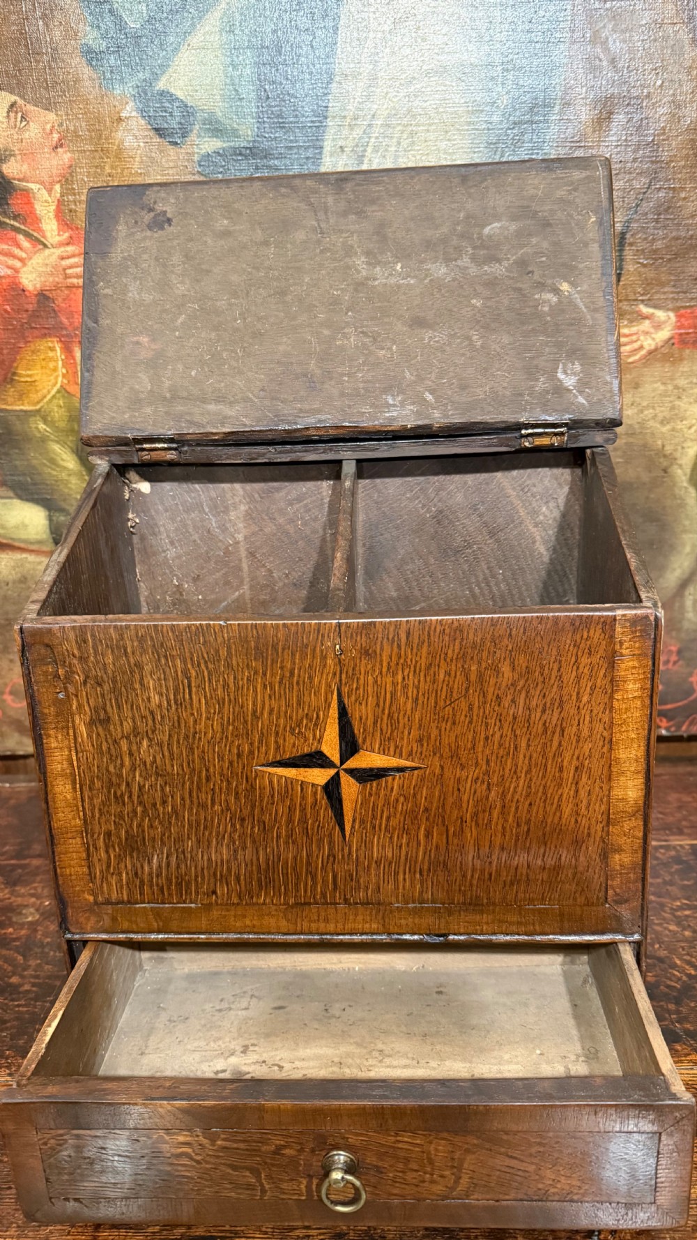 A 19th-century wall-mounted oak box featuring a star marquetry inlay, a heart-shaped hanging cut-out, and a lower drawer with a metal ring pull. View VIII