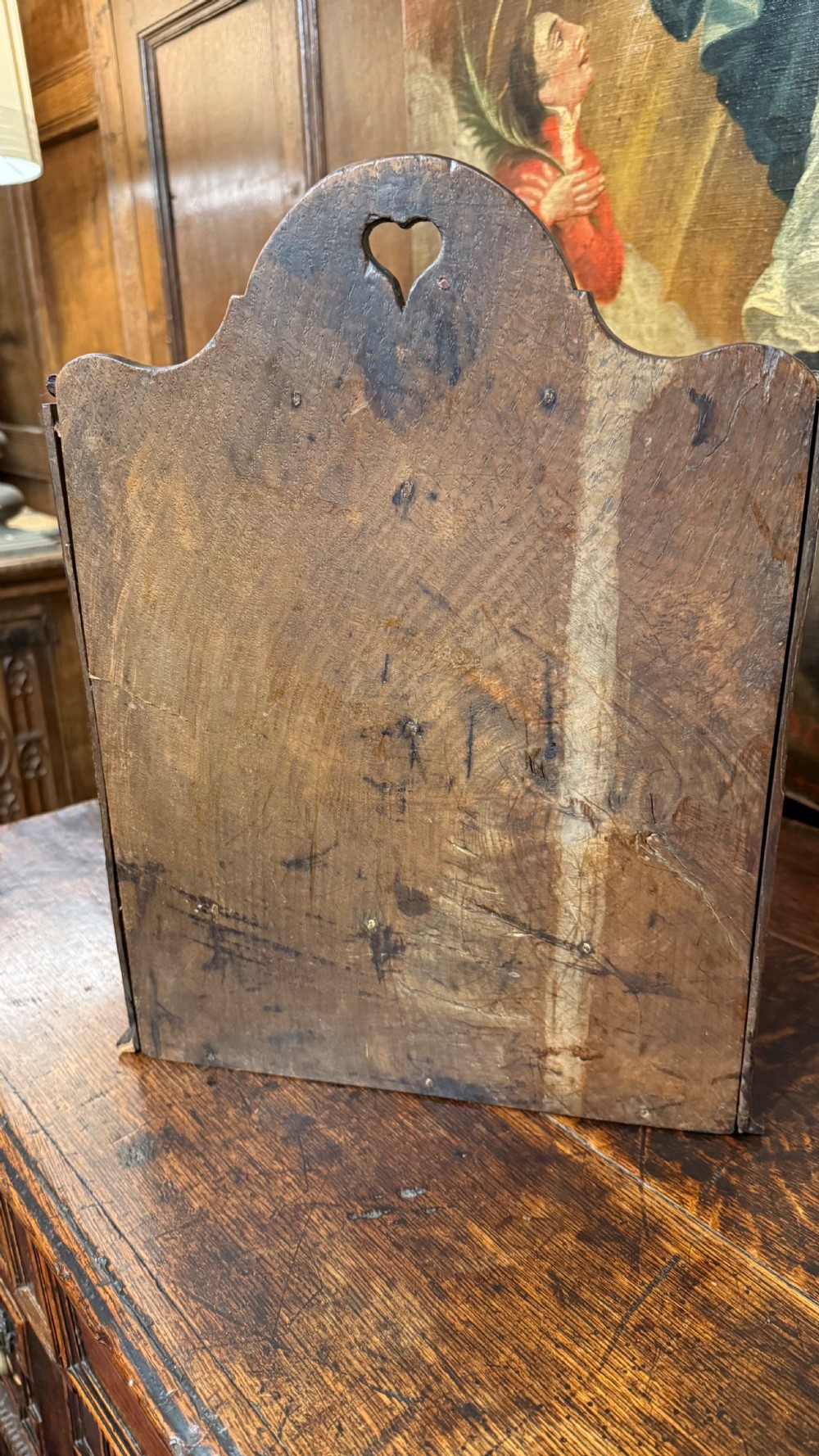 A 19th-century wall-mounted oak box featuring a star marquetry inlay, a heart-shaped hanging cut-out, and a lower drawer with a metal ring pull. View XIV