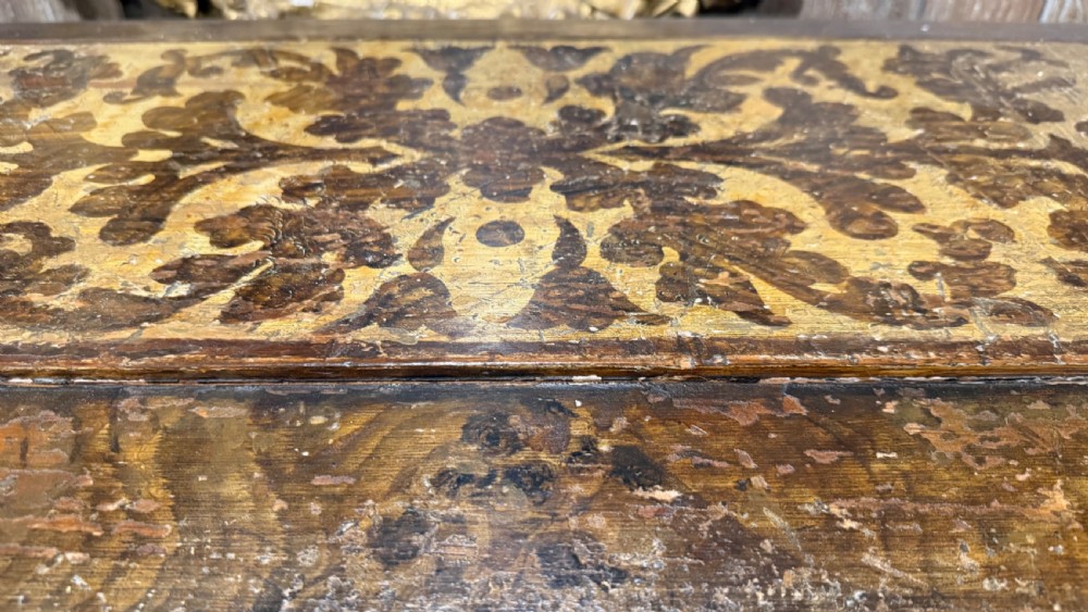 A nineteenth-century warm brown wooden tabletop collectors cabinet featuring intricate foliate marquetry inlay panels on the twin doors and top. View XXI