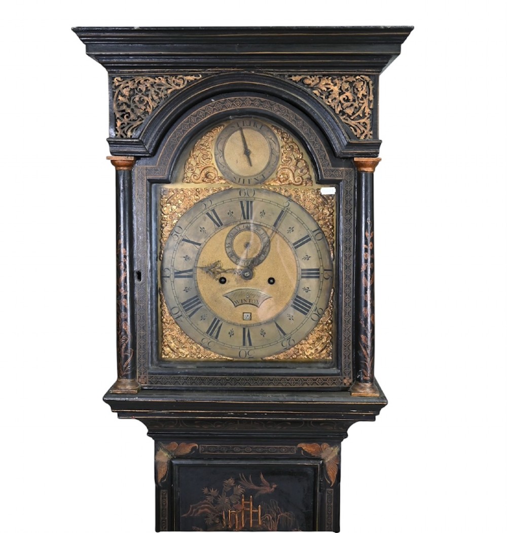 An 18th-century black japanned longcase clock decorated with gold chinoiserie scenes and featuring an arched brass dial. View XIII