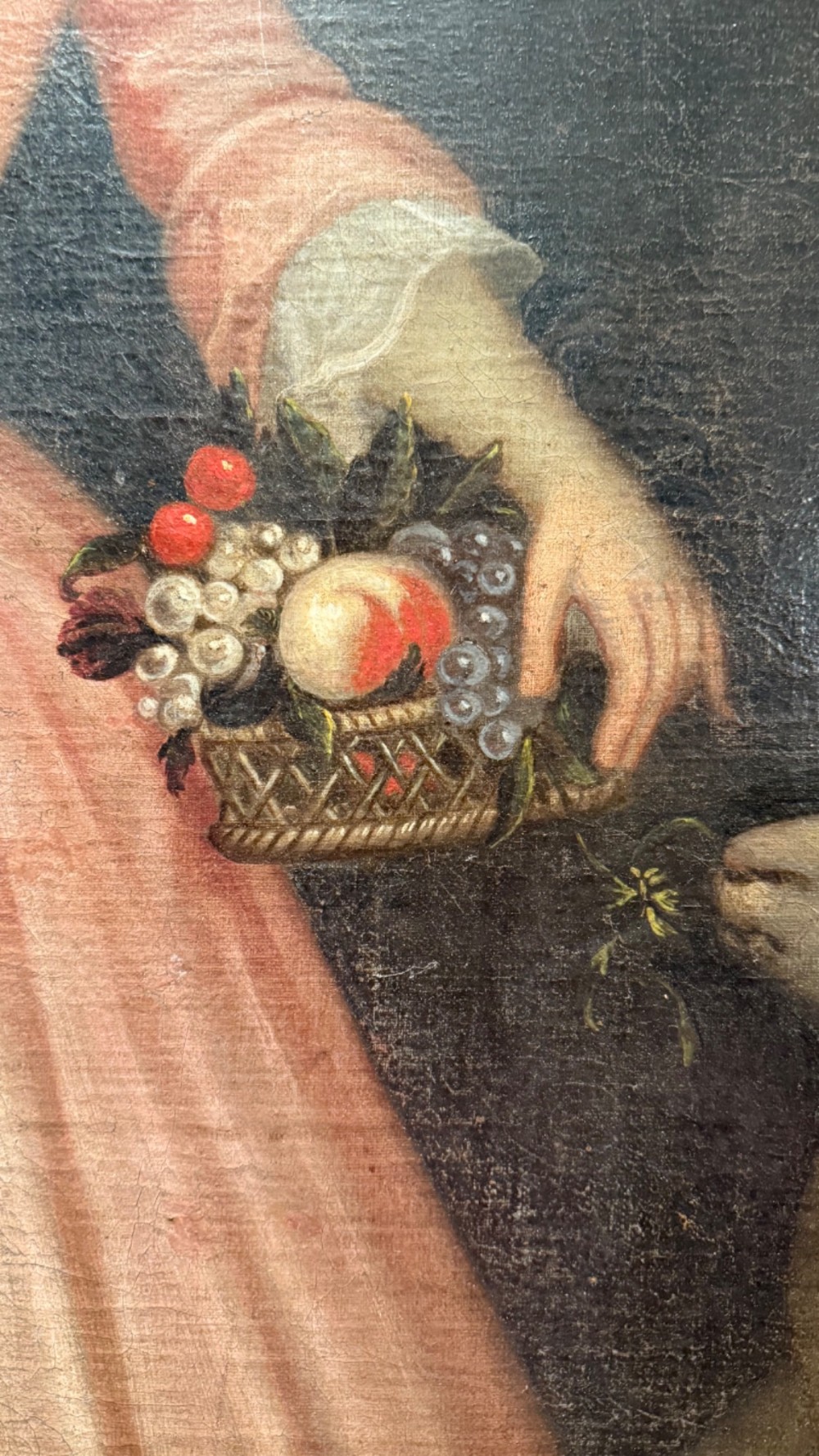 An eighteenth-century oil painting of a young girl in a pink dress holding a floral wreath, set alongside a lamb within an elaborate gold gilt frame. View VI