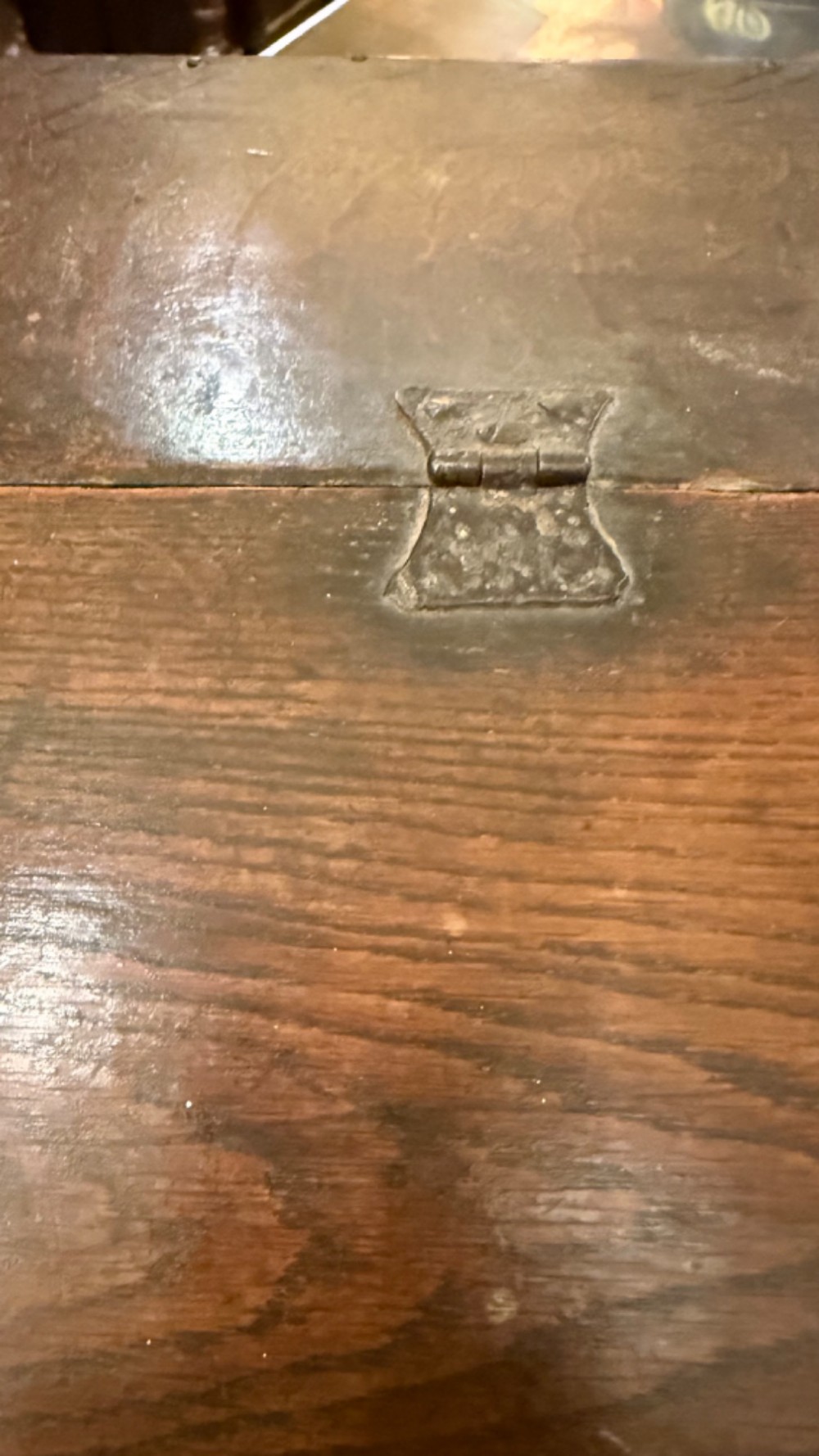 An 18th-century oak Bible box featuring a sloped hinged lid, incised initials WB, the date 1733, and a central iron lock plate. View VI