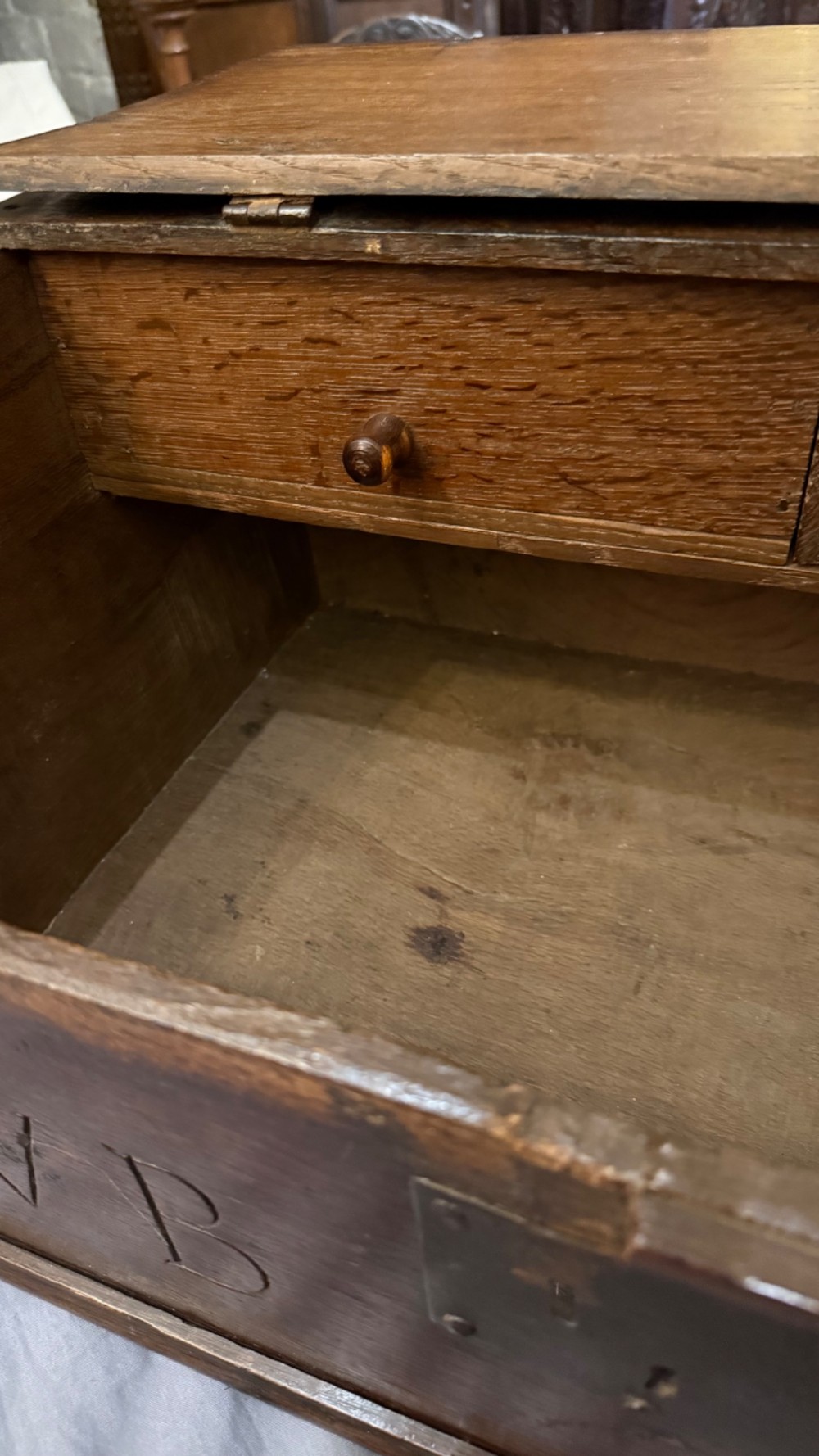 An 18th-century oak Bible box featuring a sloped hinged lid, incised initials WB, the date 1733, and a central iron lock plate. View IX