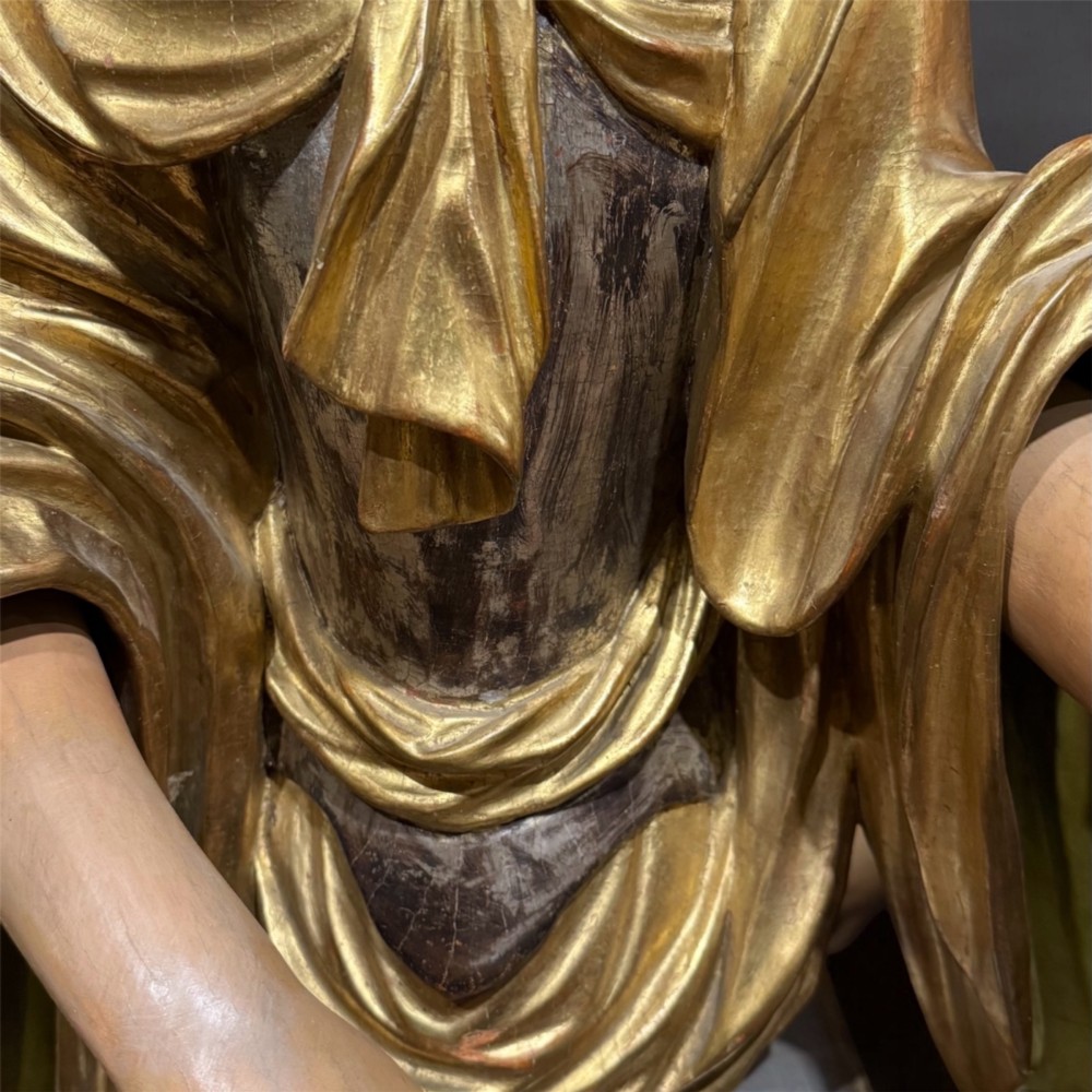 A seventeenth-century carved wooden bust of Saint Dorothea featuring gilded drapery and polychrome painted skin tones mounted on a decorative cartouche base. View VIII