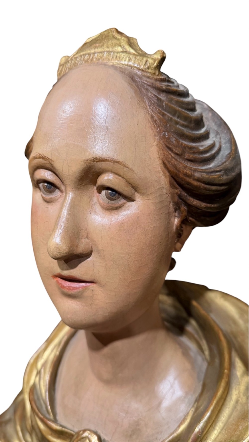 A seventeenth-century carved wooden bust of Saint Dorothea featuring gilded drapery and polychrome painted skin tones mounted on a decorative cartouche base. View XIII