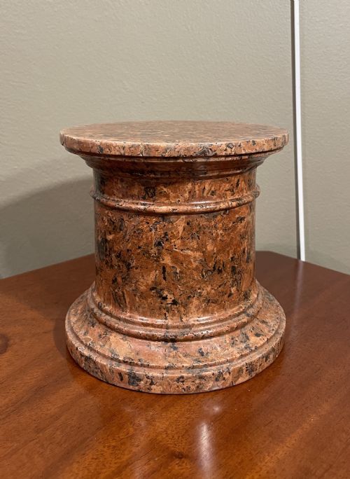 A Pink Granite Bust Plinth Pedestal