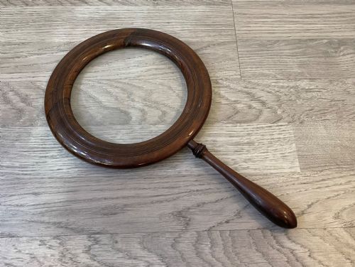 A Large Regency Rosewood Hand Held Magnifying Gallery Glass. The Glass Lens Surrounded by a Circular Border and Turned Handle.