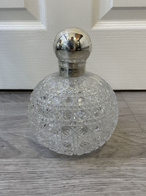 A Very Large Victorian Solid Silver Topped Globular Cut Glass Scent Bottle