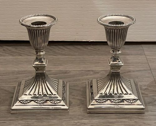 Pair of Victorian Solid Silver Candlesticks.