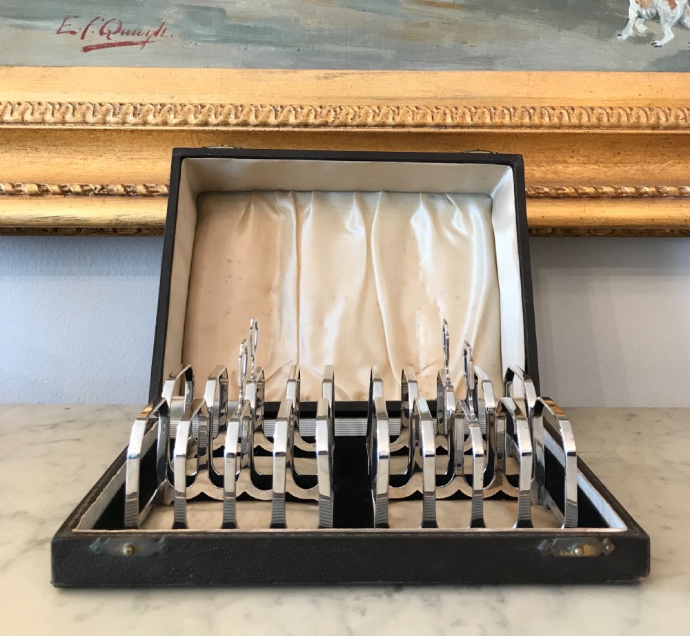 Set of Four Art Deco Solid Silver Toast Racks