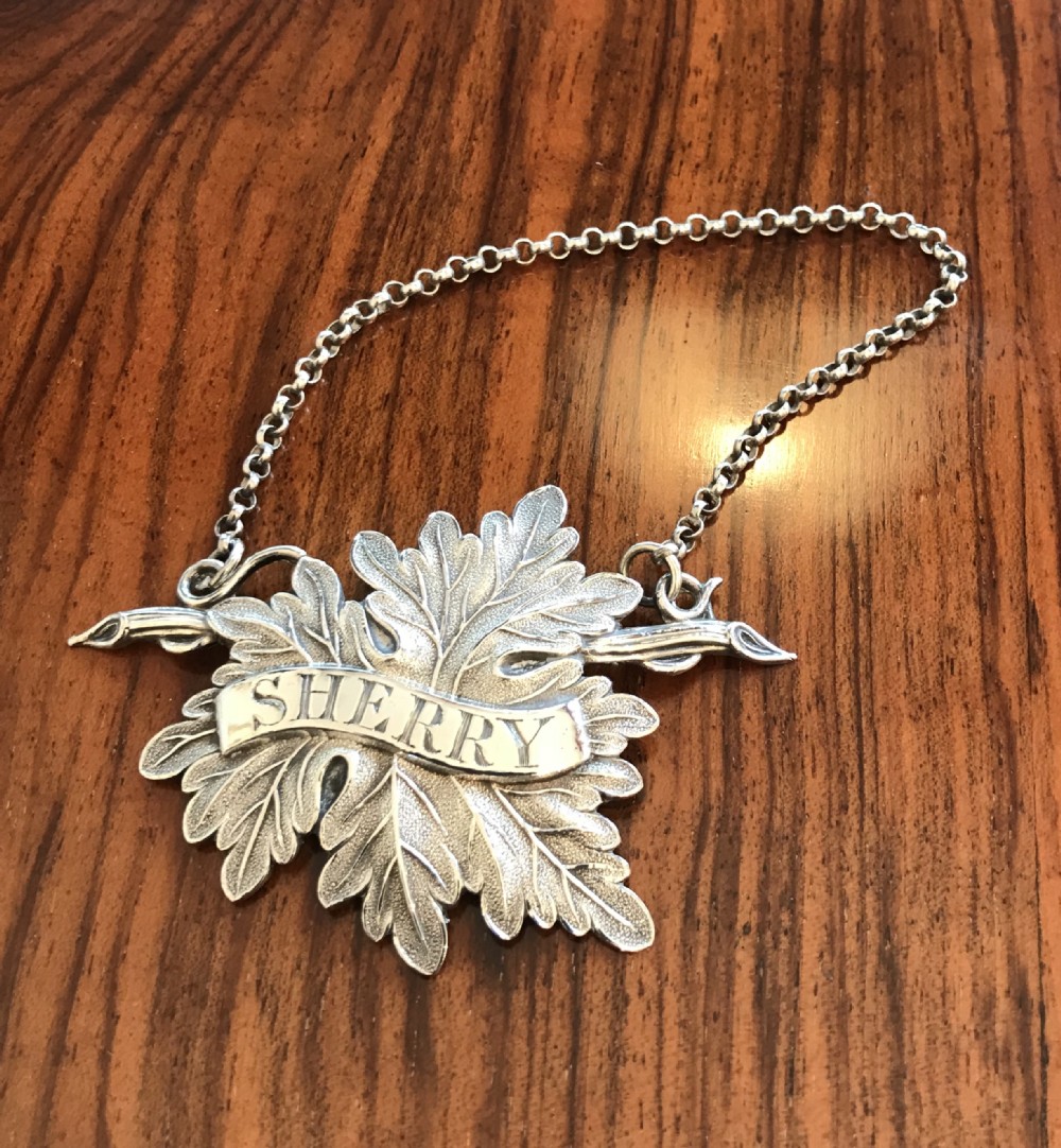 A quality William IV silver Sherry label by Joseph Wilmore