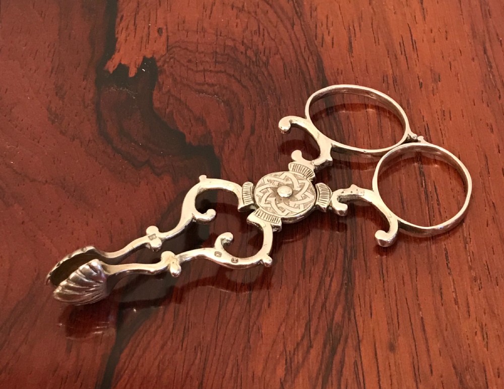 A Pair Victorian Silver Sugar Nips View VI