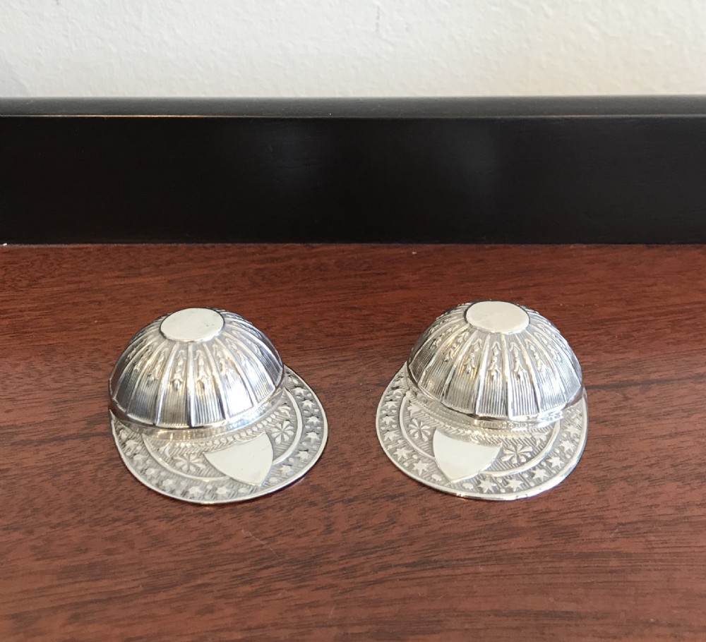 Pair of Silver Jockey Cap Caddy Spoons