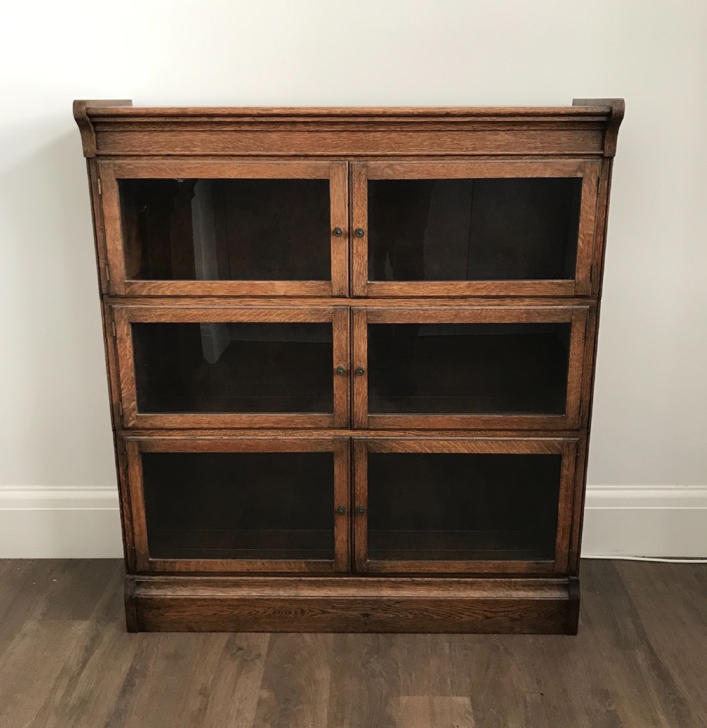 A good oak stacking bookcase by Minty