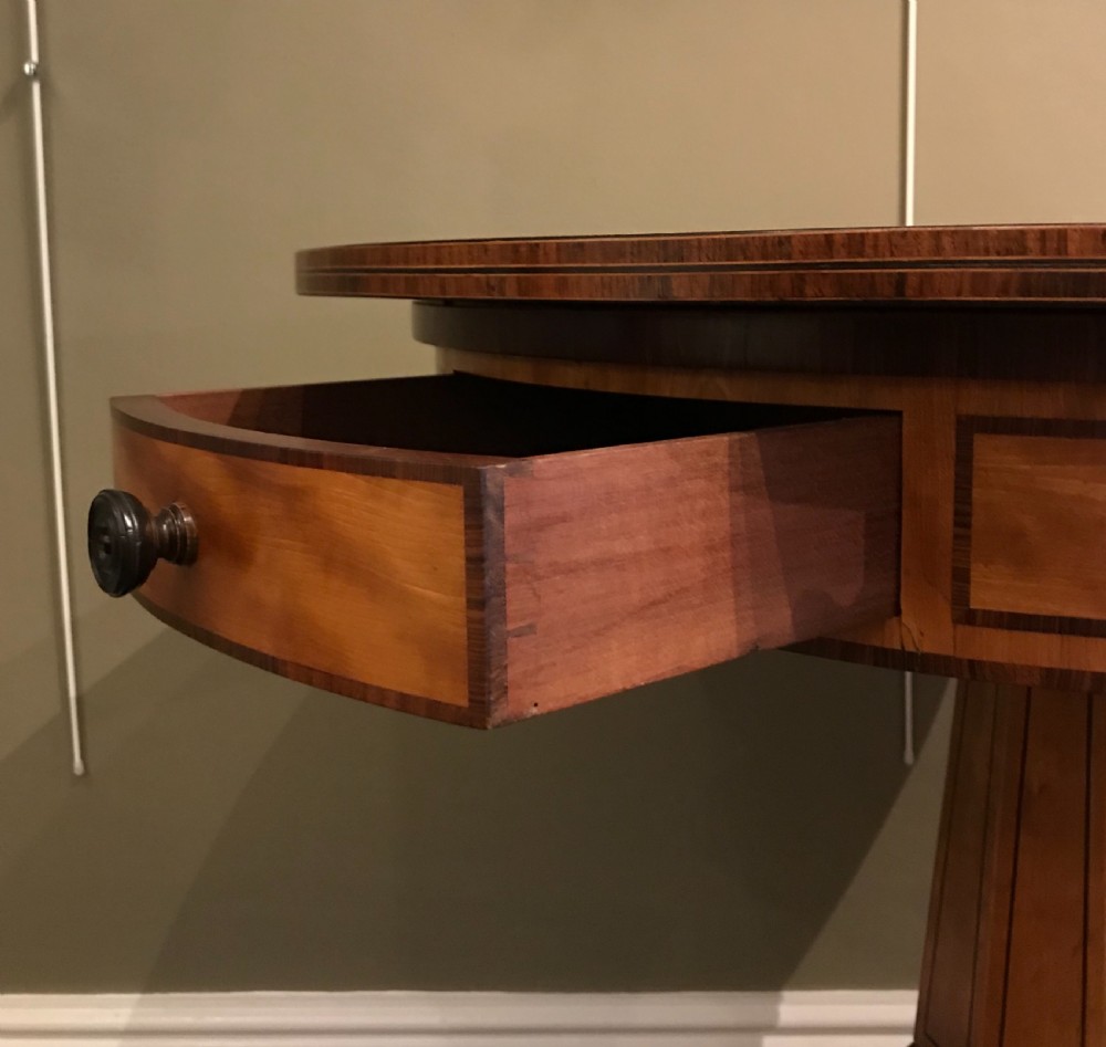 George IV satinwood drum table View IV