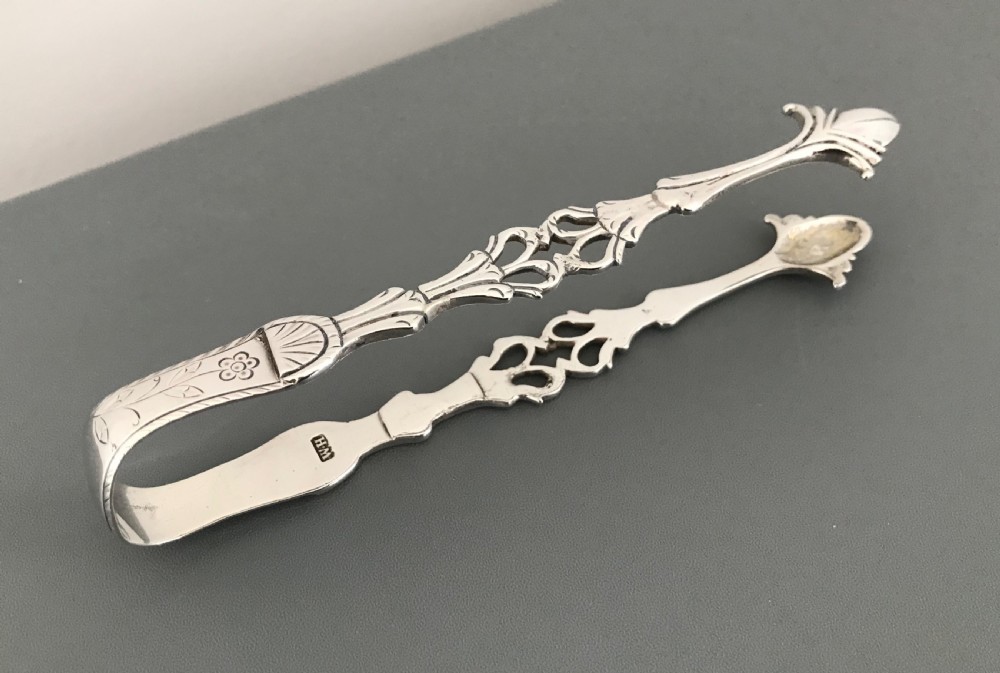 Three Georgian Cast Silver Sugar Tongs View III
