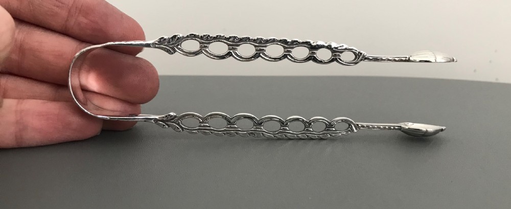 Super Rare Pair of Georgian Cast Silver Sugar Tongs View III