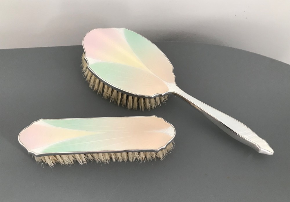 A good pair of George VI Silver and Enamel Brushes, 1937