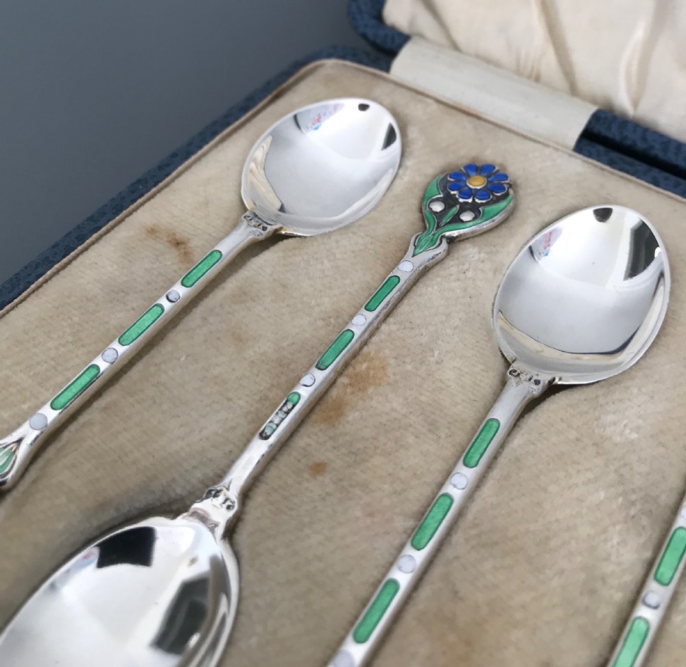 Very pretty set of Solid Silver & Enamel Spoons View V