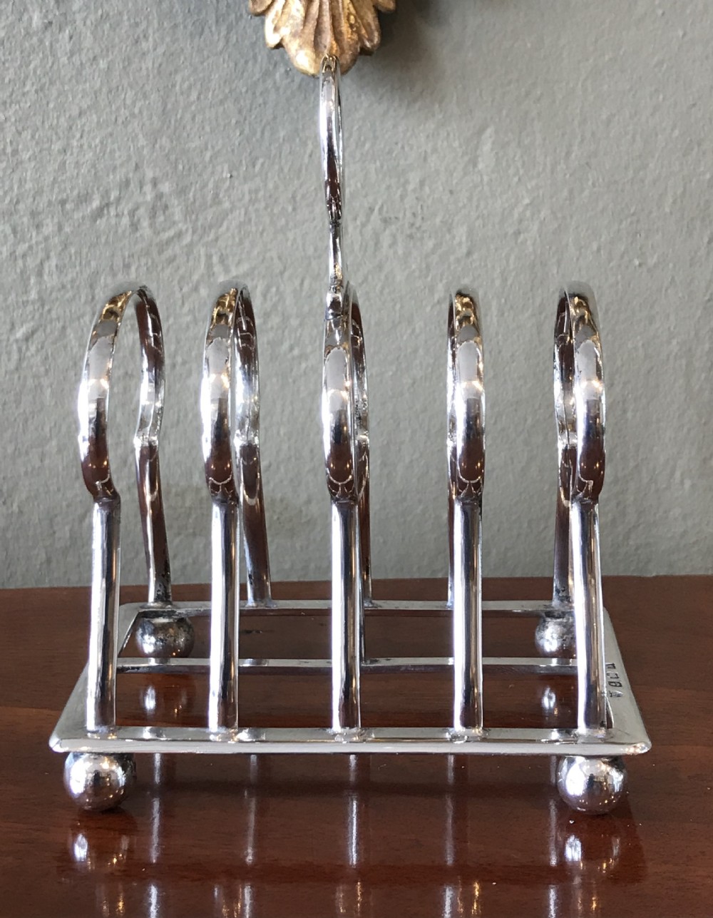 George V silver ‘key hole’ toast rack  View V